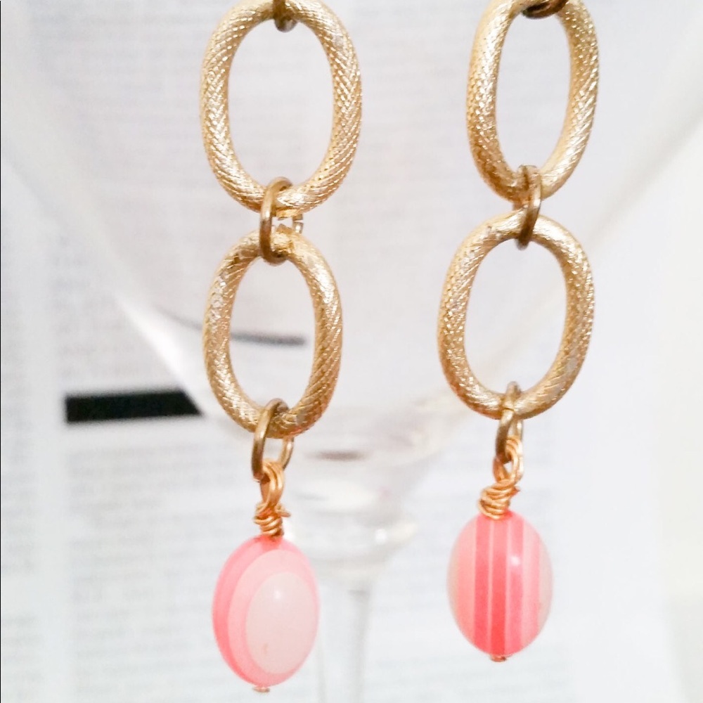 Gold and pink shades bead dangle earrings.
